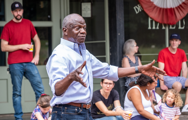 Michael speaking at a July 4th event